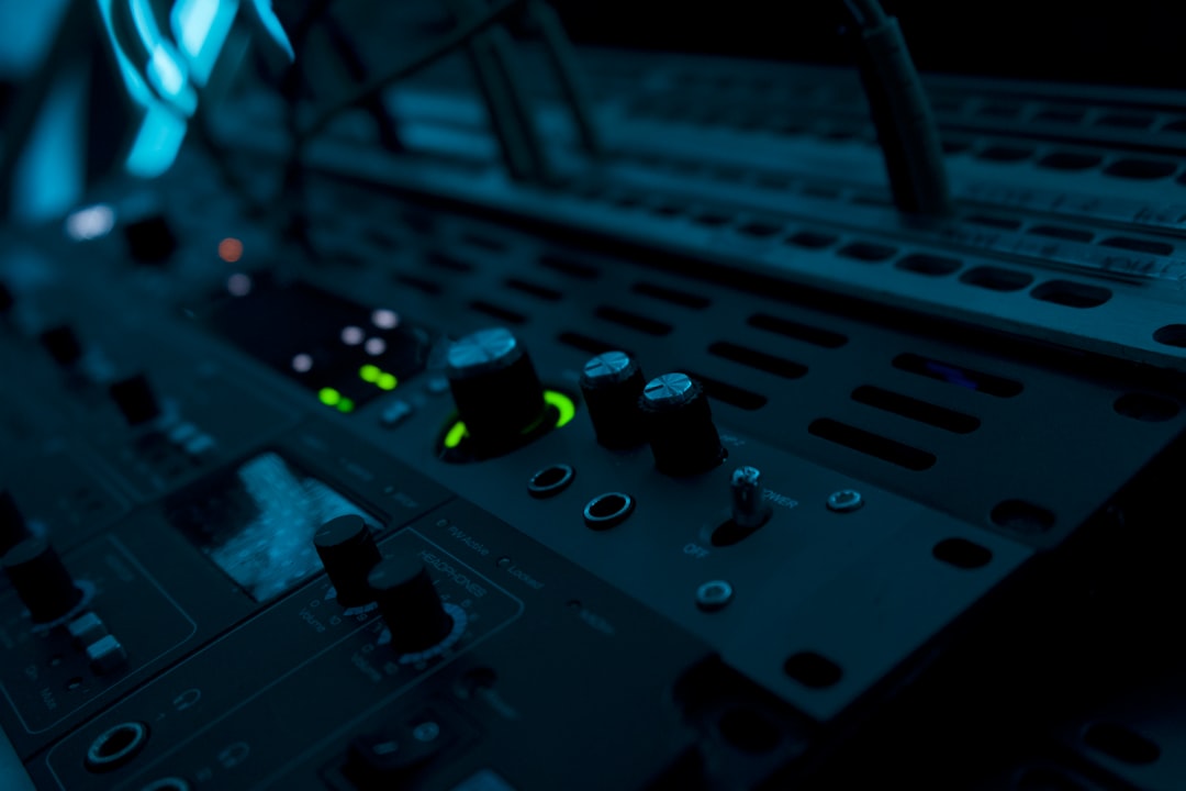 a close up of a control panel in a recording studio
